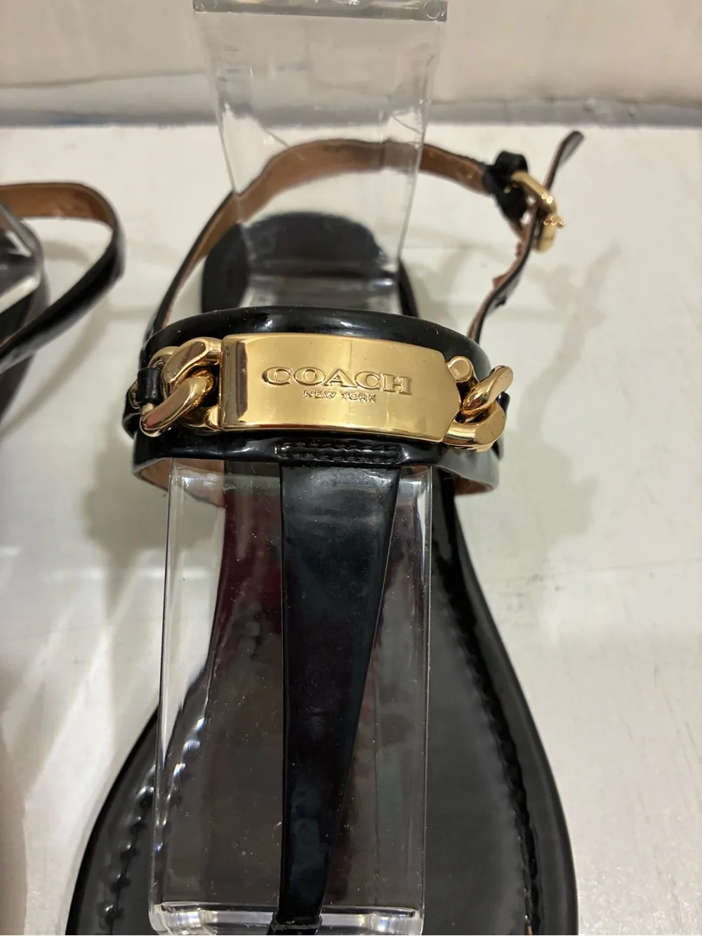 Coach Black Patent Leather T-Strap Sandals with Gold Plaque